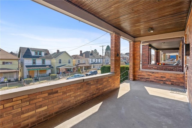 view of patio with a residential view