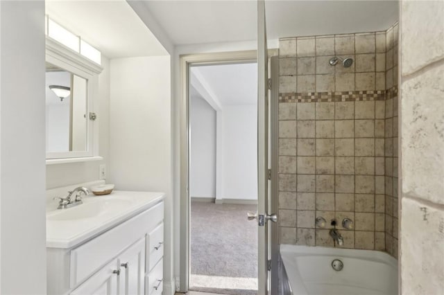 bathroom featuring shower / bath combination and vanity