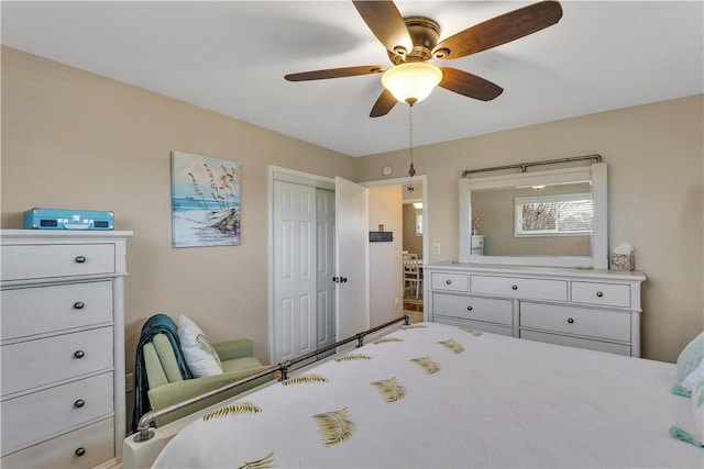 bedroom with a closet and a ceiling fan