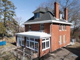 rear view of house with a chimney