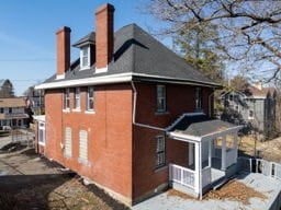 view of property exterior with a chimney