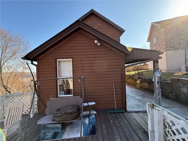 exterior space featuring a wooden deck