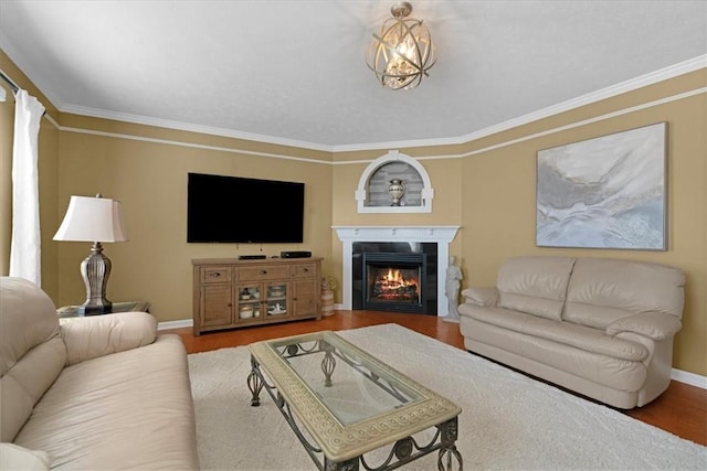 8004 Maureen Dr, Cranberry Twp, PA 16066 - living room featuring ornamental molding, wood finished floors, baseboards, and a glass covered fireplace
