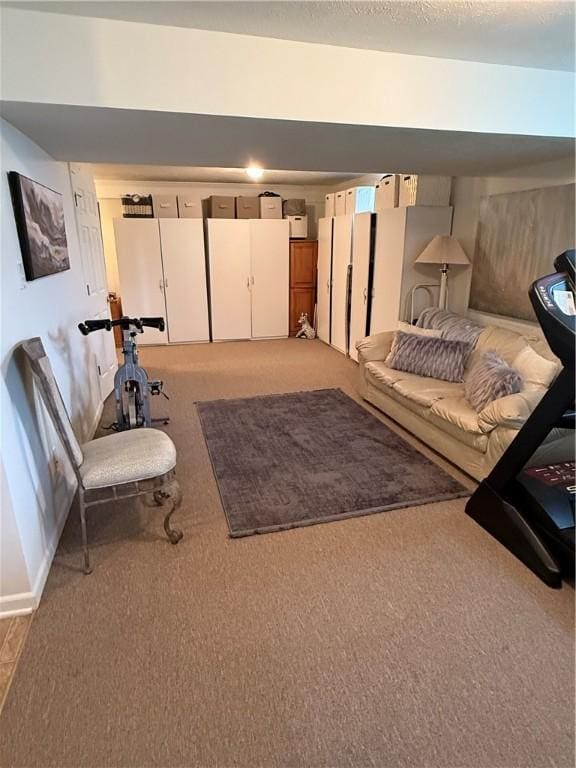 living room featuring baseboards and light carpet
