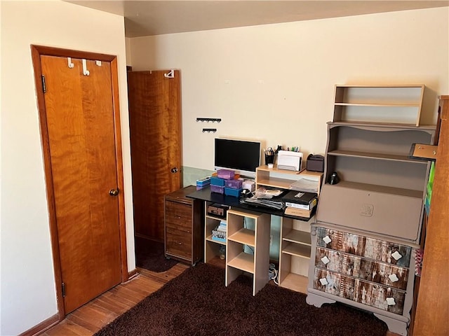 home office featuring wood finished floors