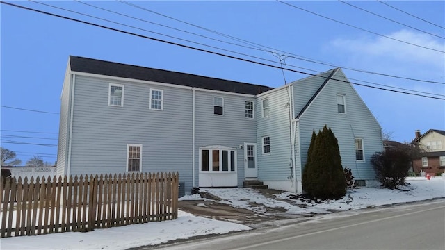 view of front of house featuring fence and entry steps