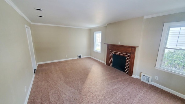 unfurnished living room with visible vents, carpet floors, baseboards, and crown molding