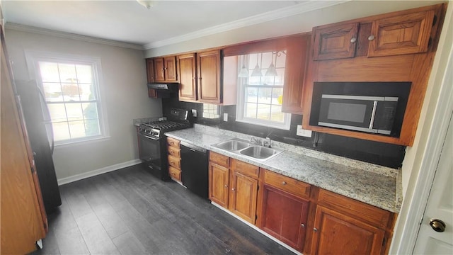 kitchen with dark wood-style flooring, a sink, decorative backsplash, black appliances, and brown cabinets