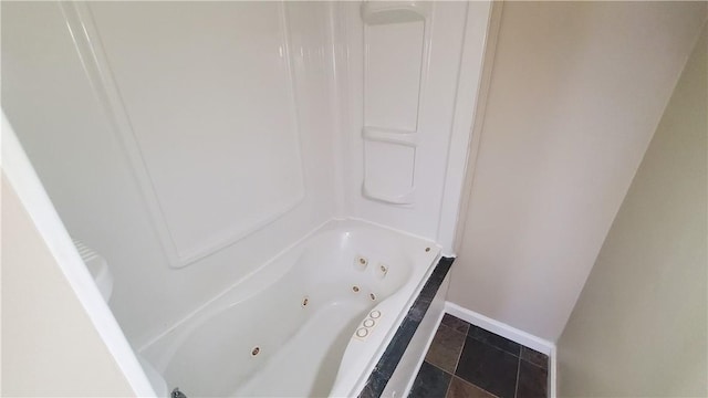 full bathroom with baseboards