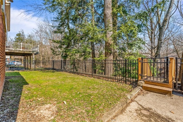 view of yard with a deck and fence private yard