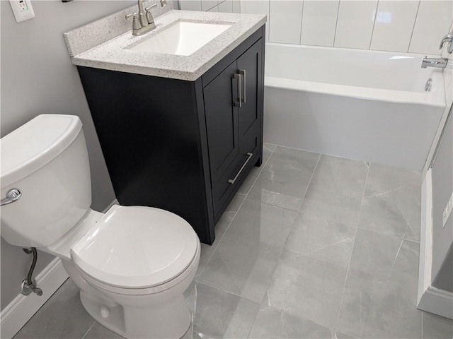 bathroom featuring vanity, toilet, a bath, and tile patterned flooring