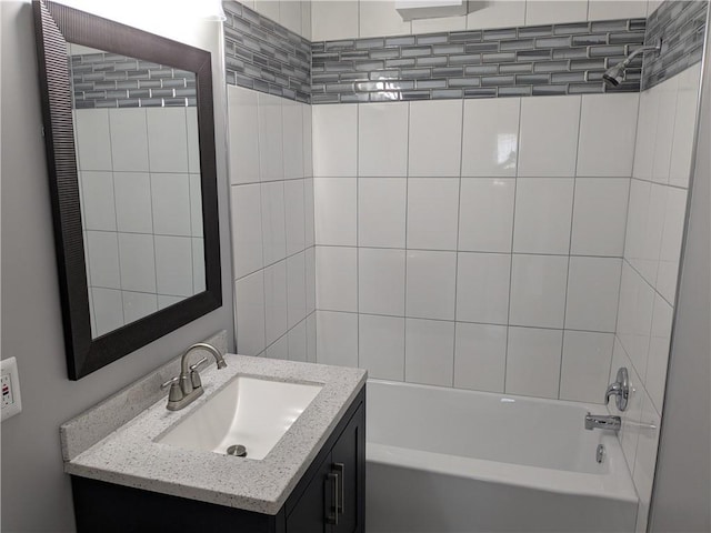 bathroom with tub / shower combination and vanity