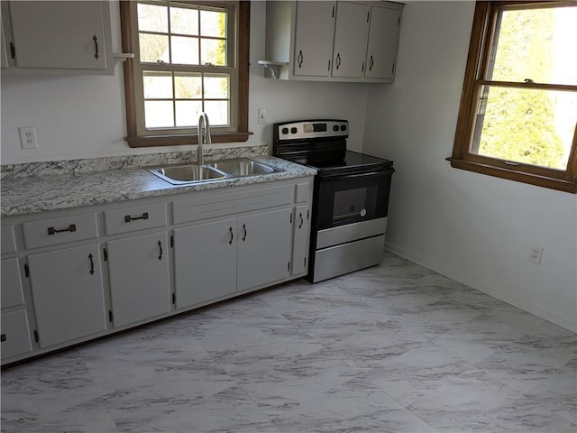 kitchen with stainless steel electric range oven, baseboards, open shelves, a sink, and marble finish floor