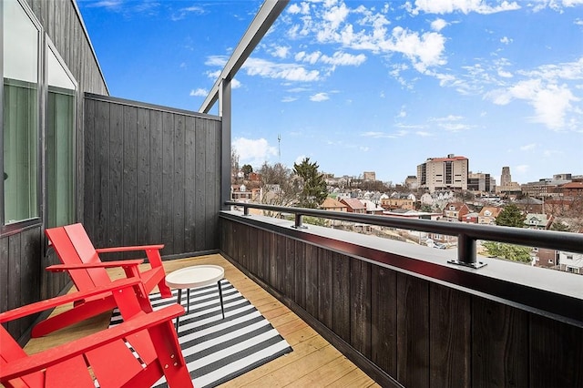 balcony featuring a city view