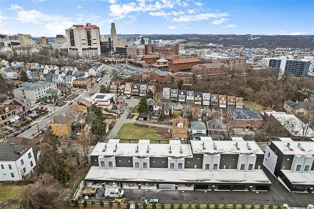 drone / aerial view featuring a city view