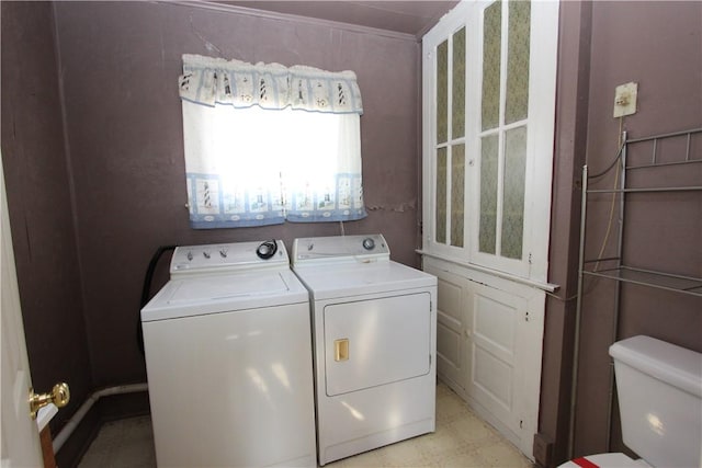 laundry area with laundry area and separate washer and dryer