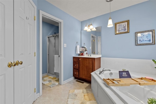 bathroom featuring visible vents, baseboards, a garden tub, a stall shower, and vanity