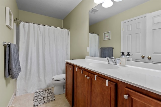 full bath with visible vents, toilet, vanity, and tile patterned flooring