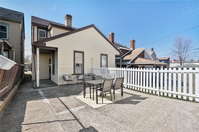 view of patio / terrace featuring outdoor dining area and a fenced backyard