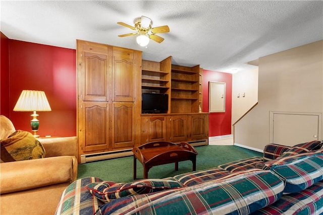 living area with a textured ceiling, baseboard heating, ceiling fan, and carpet