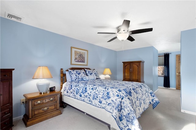 bedroom with visible vents, baseboards, carpet, and ceiling fan