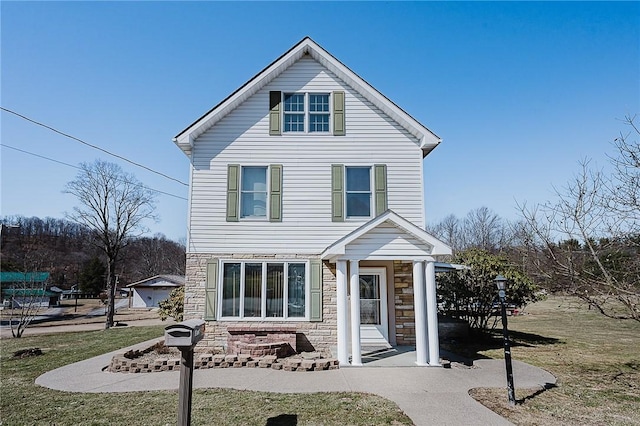 traditional home with stone siding