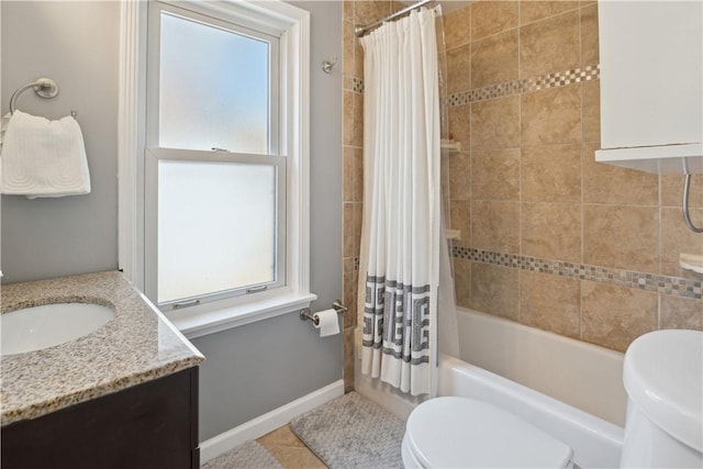 bathroom with toilet, shower / tub combo with curtain, tile patterned flooring, baseboards, and vanity