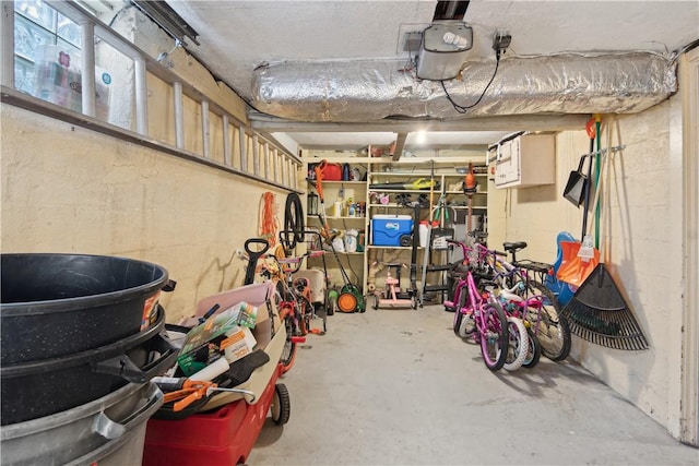 garage with concrete block wall