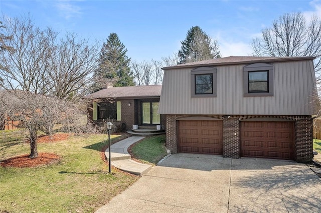 tri-level home featuring brick siding, an attached garage, a chimney, and driveway