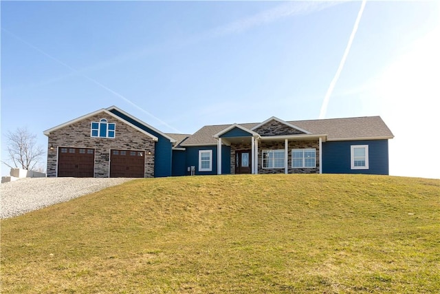 view of front of property with a front lawn and driveway