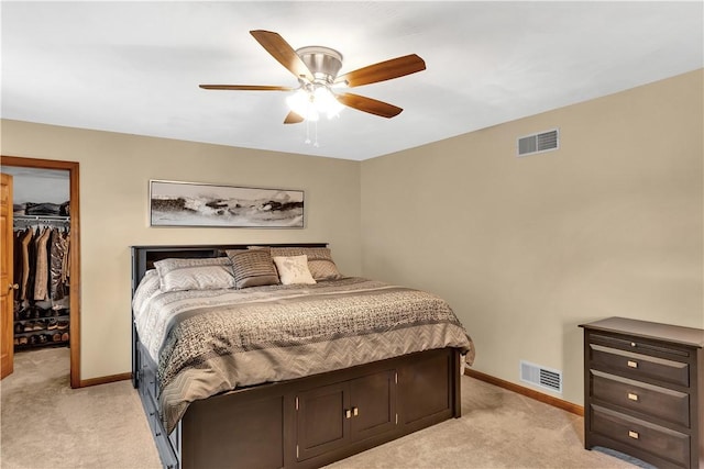 bedroom featuring visible vents, baseboards, and a spacious closet