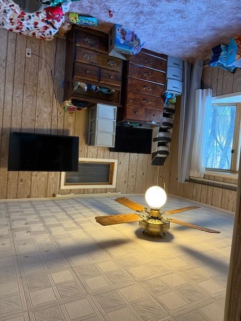 kitchen featuring wood walls