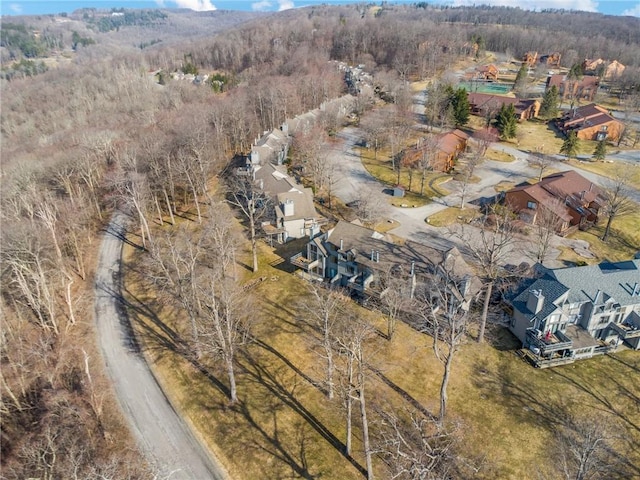 aerial view featuring a forest view