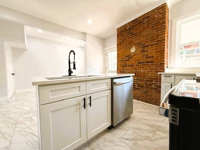 kitchen with white cabinetry, a sink, light countertops, dishwasher, and marble finish floor