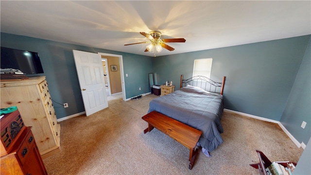 bedroom featuring carpet, baseboards, and ceiling fan