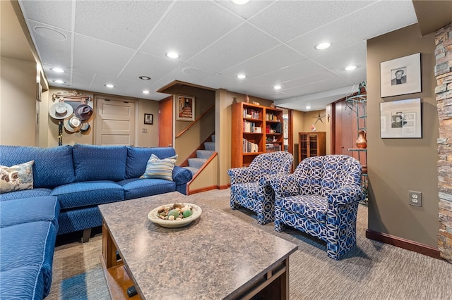 living area with stairway, recessed lighting, baseboards, and carpet floors