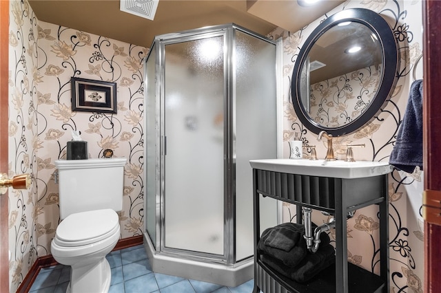 full bath with wallpapered walls, a shower stall, visible vents, and tile patterned flooring