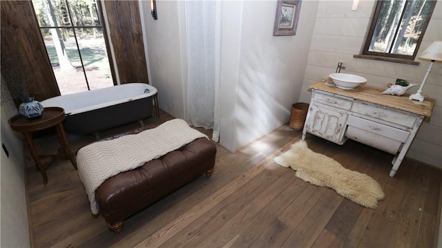 000 Wonder Ln, Punxsutawney Area School District, PA 15767 - full bathroom with wood-type flooring, a freestanding tub, and vanity