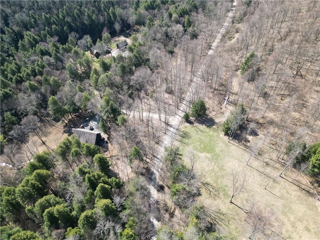 aerial view featuring a view of trees