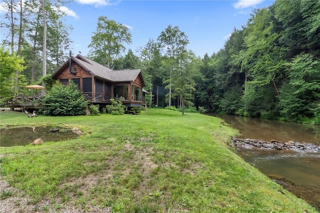 000 Wonder Ln, Punxsutawney Area School District, PA 15767 - view of green lawn featuring a sunroom and a forest view