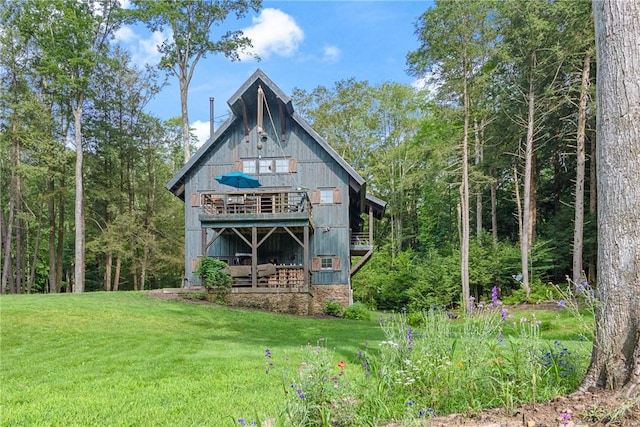 000 Wonder Ln, Punxsutawney Area School District, PA 15767 - rear view of house with a lawn, cooling unit, a forest view, and a balcony