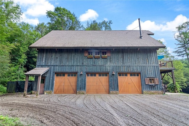 000 Wonder Ln, Punxsutawney Area School District, PA 15767 - view of front facade featuring a garage, a shingled roof, and cooling unit