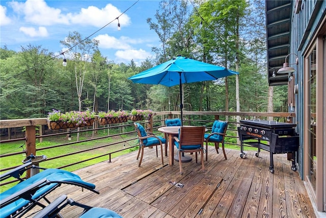 000 Wonder Ln, Punxsutawney Area School District, PA 15767 - deck featuring outdoor dining area, area for grilling, and a forest view