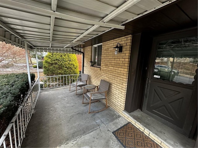 view of patio with a balcony