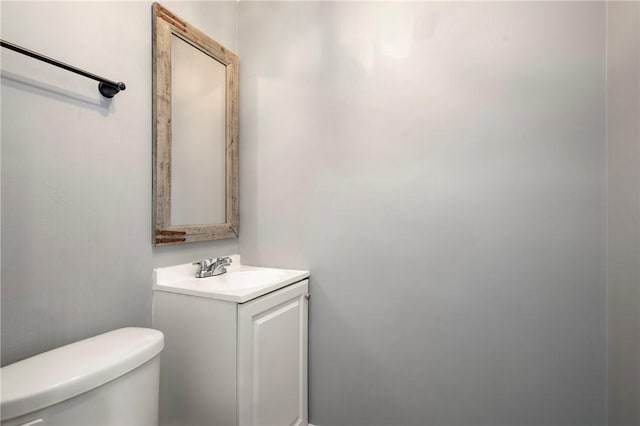 half bath with toilet and vanity