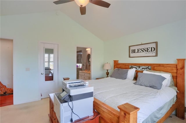 bedroom with light carpet, high vaulted ceiling, ensuite bathroom, and a ceiling fan