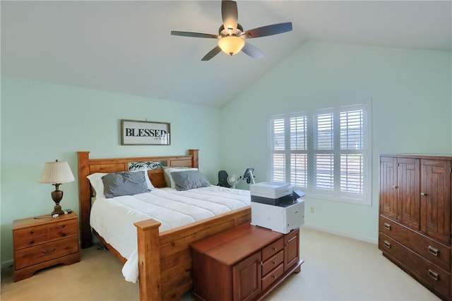 bedroom with light colored carpet, baseboards, a ceiling fan, and vaulted ceiling