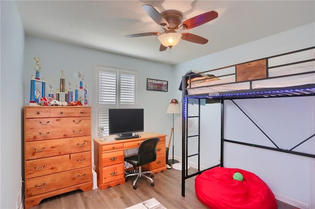 bedroom featuring light wood-style flooring