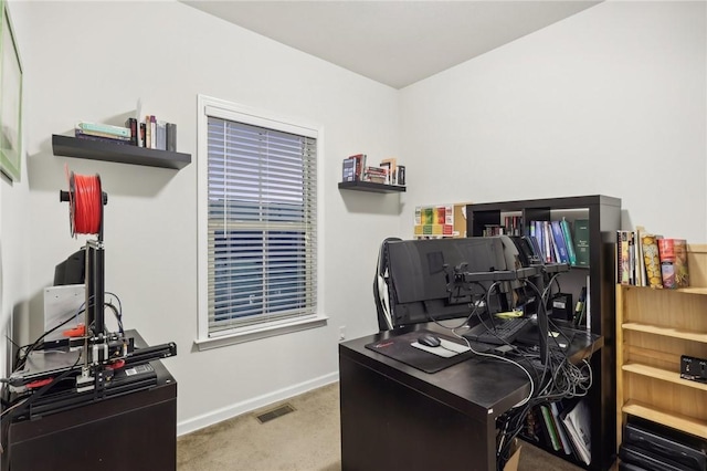 home office featuring visible vents, baseboards, and carpet