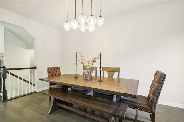 dining room with wood finished floors and baseboards